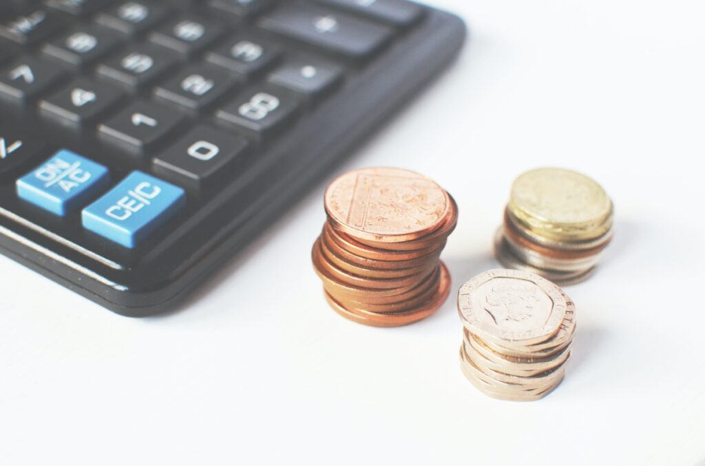 calculator and coins